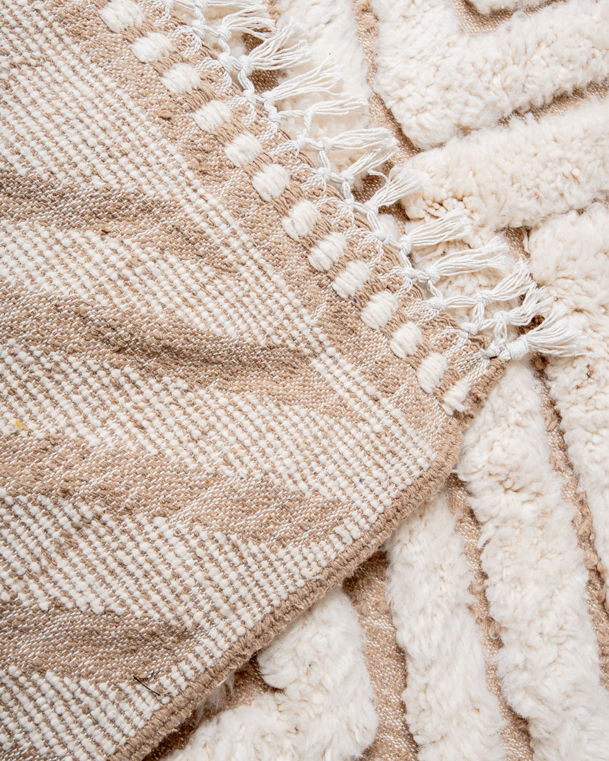Modern, designer, handcrafted Berber rug from Morocco. Beniourain carpet with beautiful colours and patterns and fluffy wool texture.